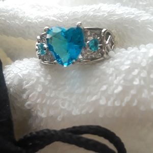 Turquoise blue heart shaped ring.
